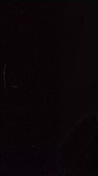 Vertical reel Light Leak and Film Damage Grunge Overlay Pack. High quality 4k footage