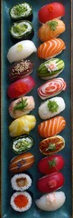 A vertical, vibrant composition of diverse sushi pieces, including nigiri and maki rolls, arranged symmetrically on a teal-colored plate, highlighting variety.