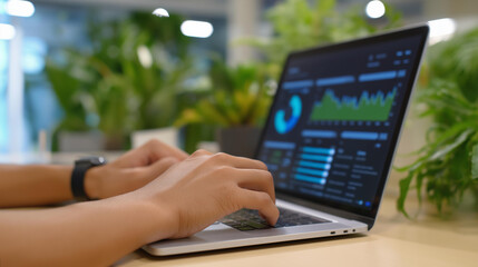 An Indian computer scientist uses an laptop for AI business data analysis on a generic automation dashboard screens showing workflow visuals a high tech workspace with plants