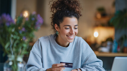 Woman Smiling After Completing an Online Shopping Payment