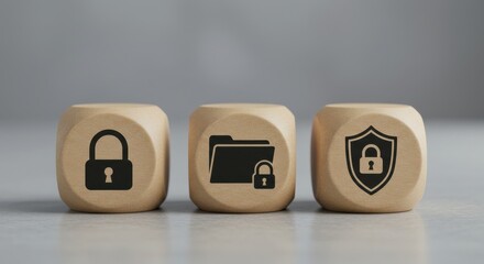 Conceptual representation of cybersecurity and data protection with padlock, folder, and shield icons on wooden blocks