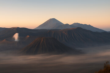 Obraz premium Sunrise over Majestic Mountain Range.