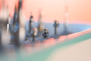 Full set of dental implant drill bits in surgical tray, close-up of professional dentistry equipment