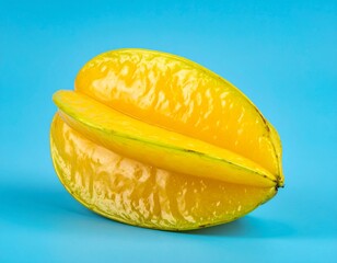 Yellow Starfruit with Unique Shape and Juicy Texture Isolated on Blue Background for Exotic Tropical Fruit Object and Healthy Food Concept