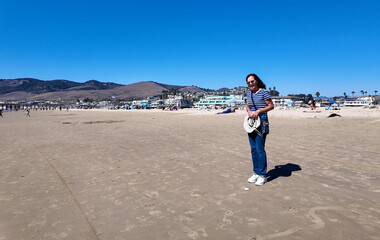 A mature Woman seeing the beach for the first time in California