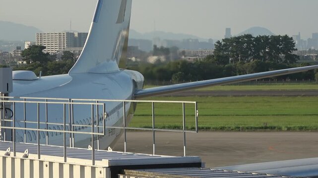 The Starlux A330 is getting ready for departure, and heat haze is visible from its engines, Sendai, 2025.09.16.