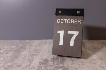 Wooden calendar with the date October 17