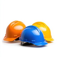 Fototapeta premium Colorful Construction Helmets in Bright Orange, Blue, and Yellow Arrangement