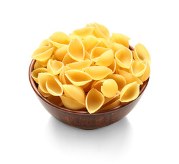 Bowl of raw conchiglie pasta isolated on white background