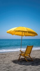 Beach umbrella and chair on sandy shore