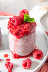 Fresh raspberry chia pudding on a plate