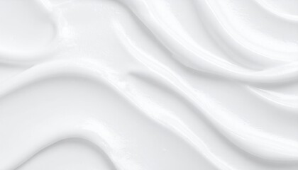 Smooth, flowing white cosmetic cream texture