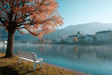 Scenic Autumn Landscape with River, Bench, and Mountains.