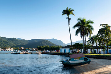 View of Paraty bay with boat on the beach