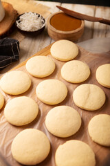 Cookies for making Alfajores. A traditional dessert popular in Latin America, it consists of two cookies sandwiched together with dulce de leche, topped with powdered sugar or shredded coconut.