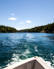 Watercraft view of a serene lake channel