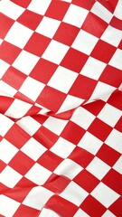 Red and white checkered fabric, wrinkled and draped