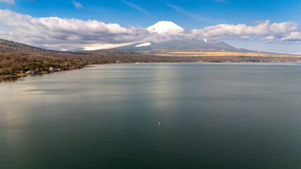 Fototapeta premium Drone view Fuji mountain and lake Yamanako, Yamanashi Prefecture, Japan