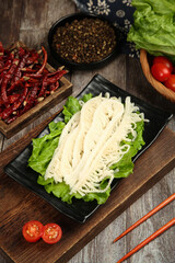 Raw Beef Tripe with Hot Peppers and Fresh Vegetables for Spicy Hot Pot Cooking Preparation