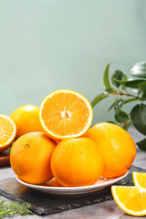 Fresh Navel Oranges on White Plate - Healthy Citrus Fruit Produce Display