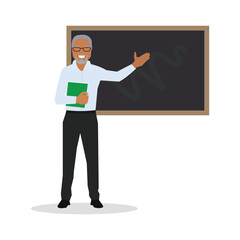 An elderly male teacher is teaching in a classroom. A blackboard is behind him.