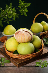 Fresh Yuhuan Pomelo Citrus Fruits in Wicker Basket - Sweet Juicy Segments Ready for Picking