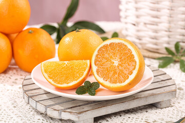 Fresh Orange Slices with Mint on Rustic Wooden Board - Healthy Citrus Fruit Display
