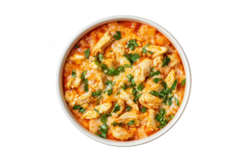 Delicious chicken paprikash stew with fresh parsley garnish in white bowl stock photo, food photography isolated on transparent background