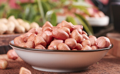 Fresh Raw Peanuts with Red Skins in Bowl - Healthy Protein Legumes and Cooking Ingredients