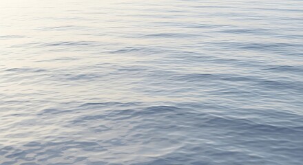 Serene expanse of calm blue ocean water with gentle waves creating a tranquil and minimalistic background