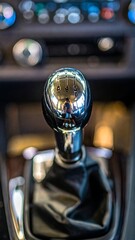 Close-up of a car's gear shift knob