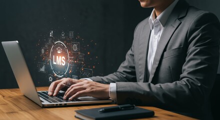 Professional utilizes learning management system on laptop for education
