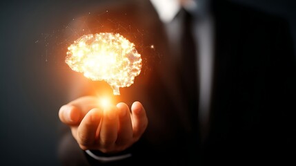 Businessman Holding Digital Brain Illustration with Glowing Light in Dark Environment