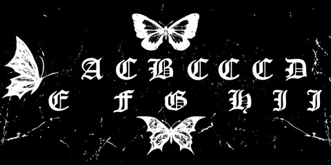 Gothic alphabet letters a to j with white butterflies on a textured black background © Smritykona