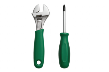 Adjustable wrench and screwdriver with green handles on transparent background