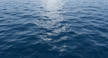 Sunlight glistening on the deep blue waves of the open ocean, a serene and tranquil water surface texture background