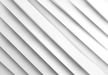 Fototapeta premium A minimalist, high-angle view of slanted, white panels casting soft shadows, creating an abstract and clean, graphic pattern