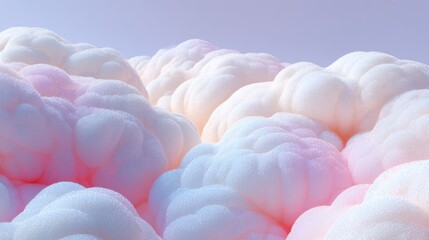 Soft and Fluffy Pastel Clouds with Gentle Hues of Pink and Blue Against a Light Sky Background