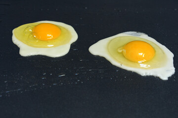 Raw Eggs Cracked on Griddle, Cooking Preparation, Breakfast Ingredient