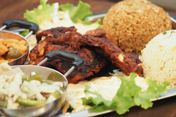 Tasty grilled chicken and rice at a local cafe