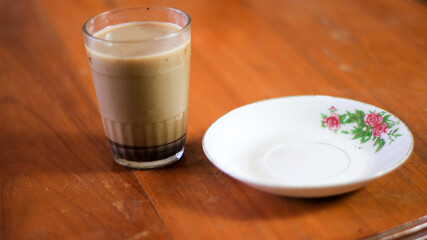 Breakfast and snack menu. Butter biscuits with pineapple jam and a glass of chocolate milk. Close-up of butter cookies and a glass of chocolate, sweet cakes. Perfect for recipes, articles, catalogs.