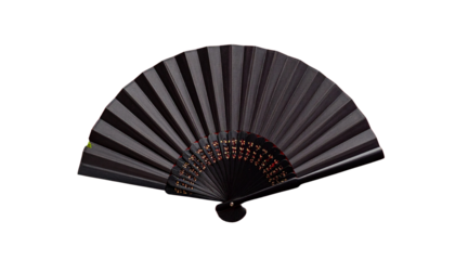 Shiny black Japanese folding fan on white background