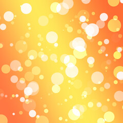 Orange and yellow bokeh background with bright white circles