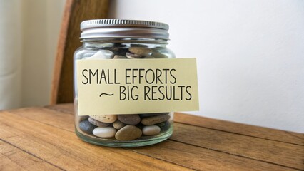 Inspiration of growth with jar full of pebbles showcasing small efforts leading to big results on wooden table