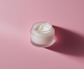 Luxury face cream on pastel pink background for youthful skin, beauty, and skincare advertisement campaigns