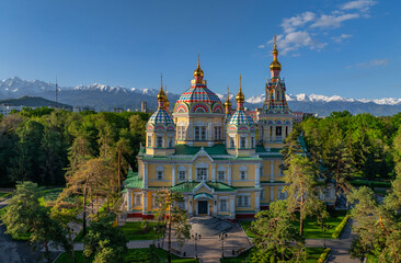 Fototapeta premium Quadcopter view of the Orthodox wooden Ascension Cathedral built in 1907 in the Kazakh city of Almaty on a spring morning