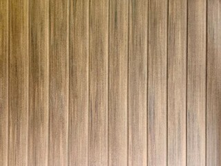 Naklejka premium Vertical wooden planks create a warm, organic textured background, showcasing natural wood grain and rich brown tones, ideal for design elements, backdrops, and surface patterns