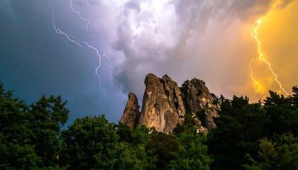 Dramatic lightning storm over rocky peaks