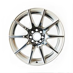 Obraz premium A shiny alloy wheel featuring a multi-spoke design, commonly used in vehicles.