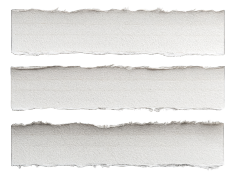 Three torn pieces of white paper